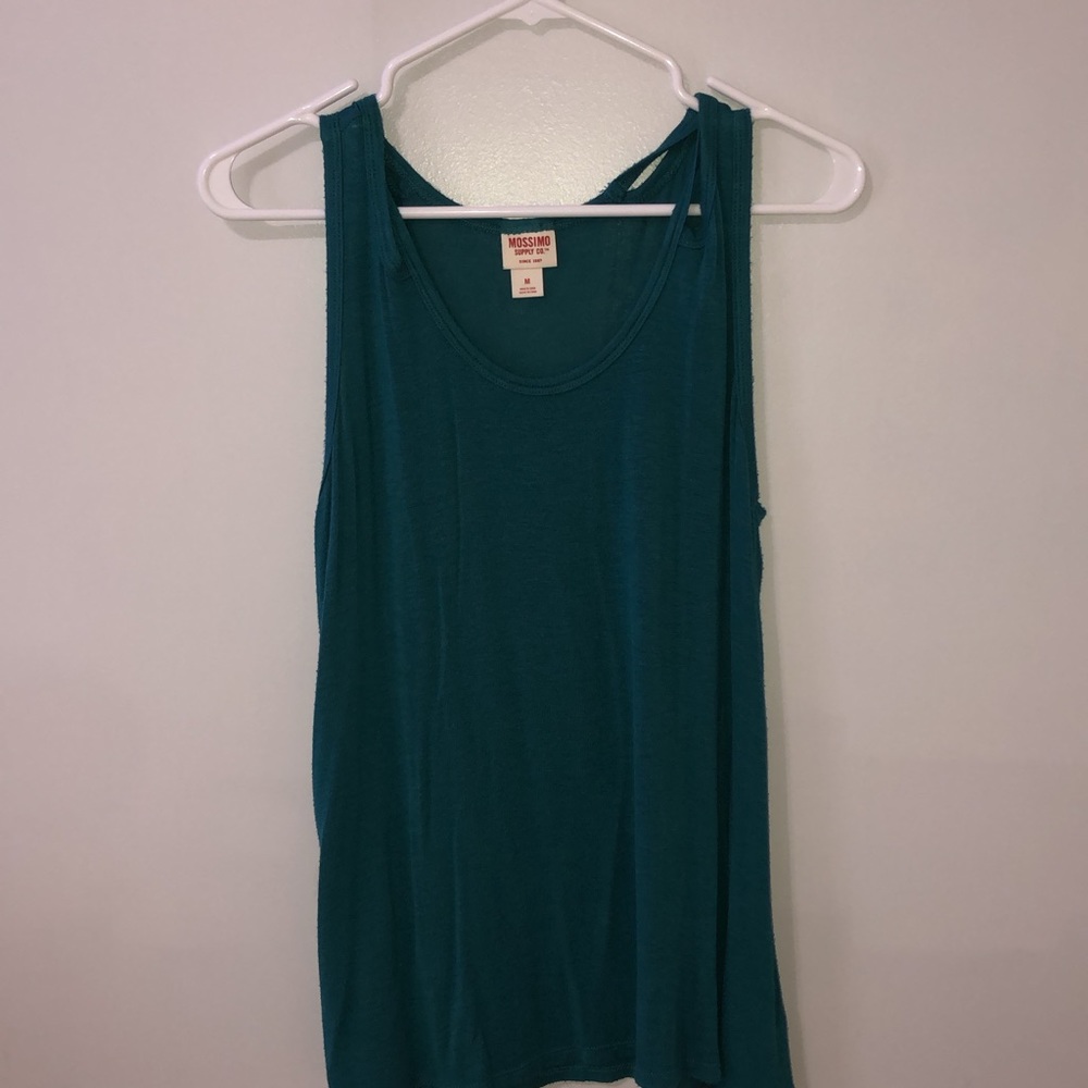 blueish green shirt